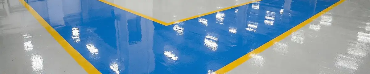 A factory floor professionally covered and marked with epoxy flooring in Spokane, WA