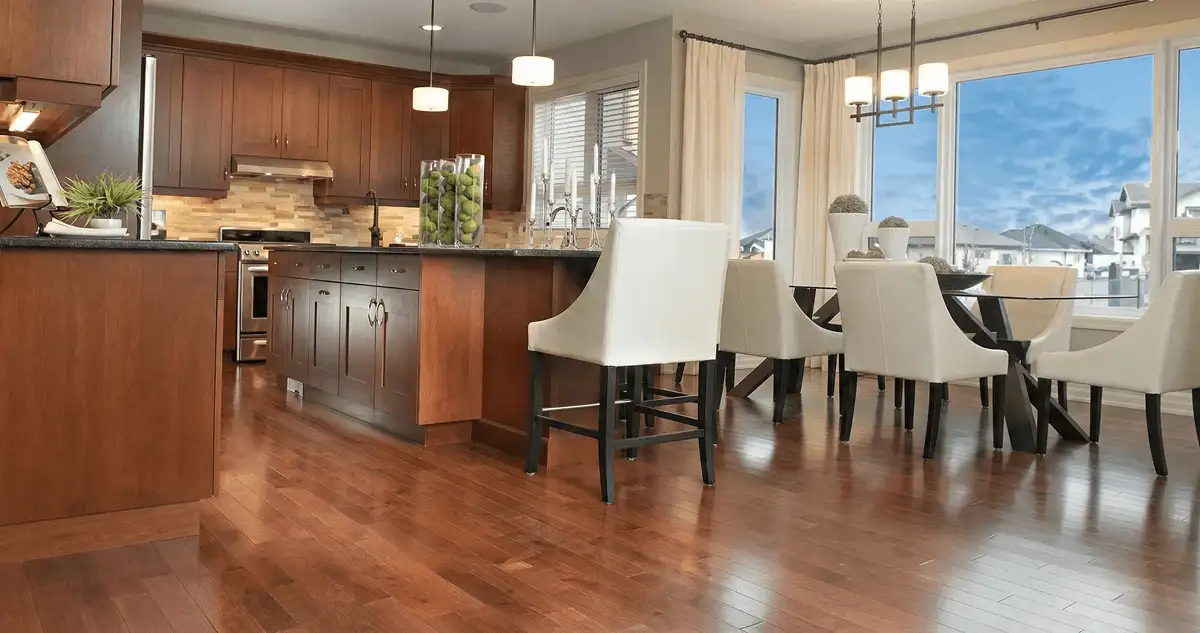 A modern kitchen with professionally installed wood flooring in Spokane, WA