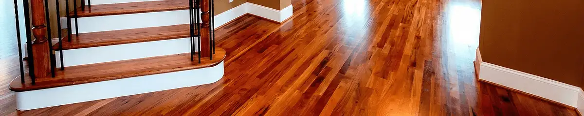 Base floor of a staircase with professionally restored wood flooring in Spokane WA