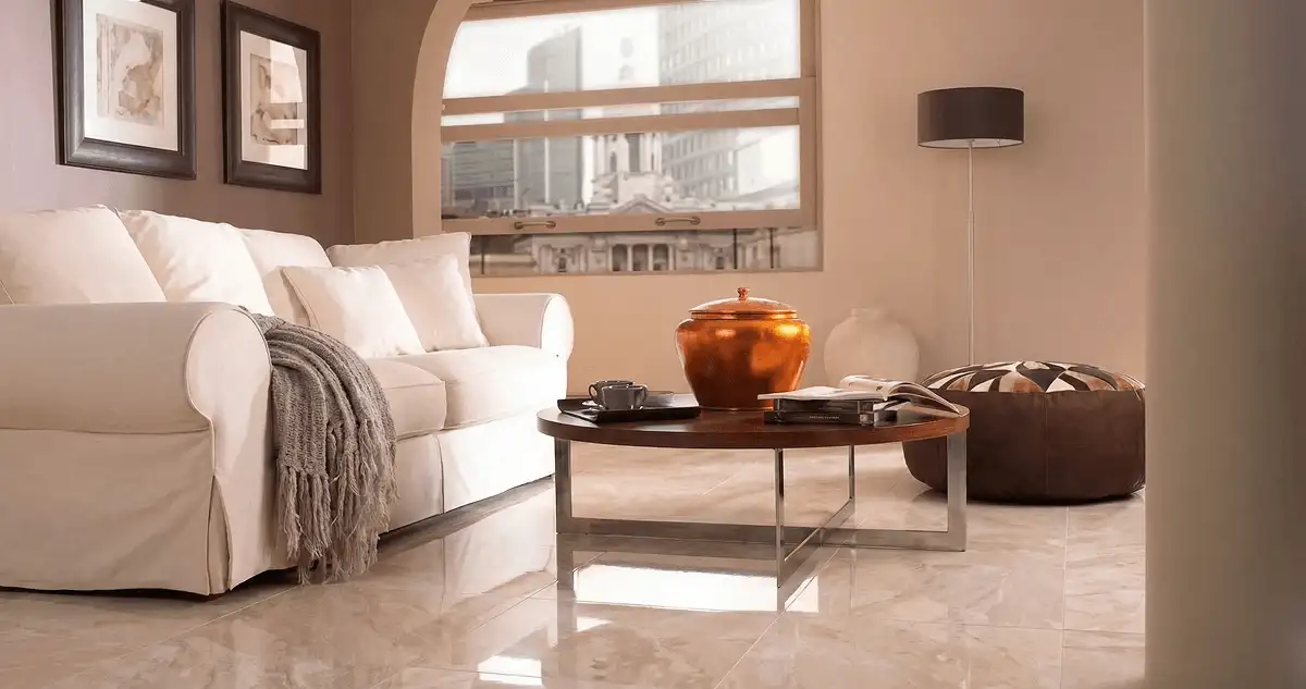 Modern living room with professionally installed marble flooring, a beige sofa, coffee table in Spokane, WA